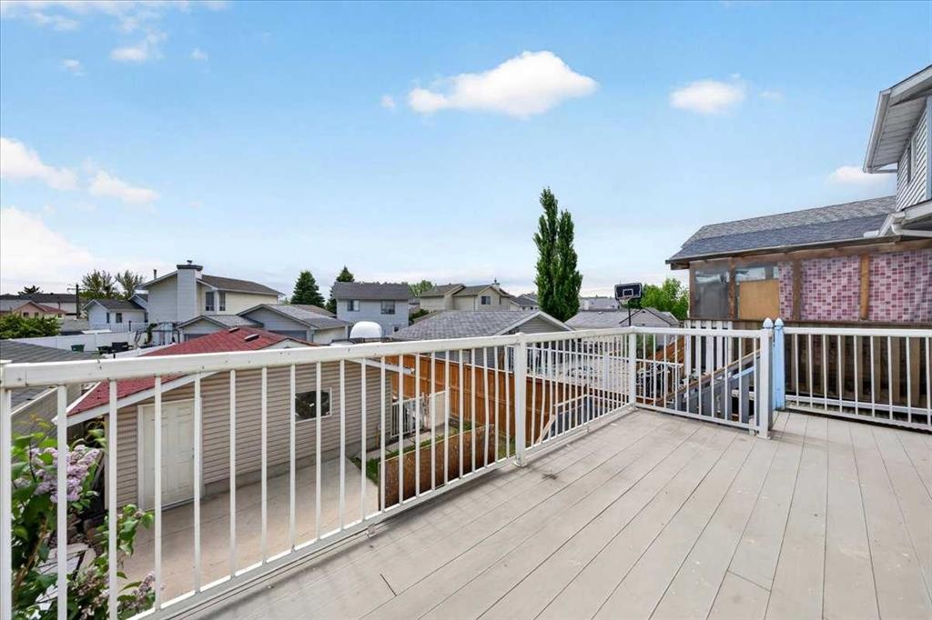 6979 Laguna Way Ne, Calgary, AB - Outdoor With Exterior