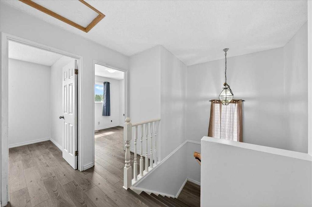 6979 Laguna Way Ne, Calgary, AB - Indoor Photo Showing Other Room