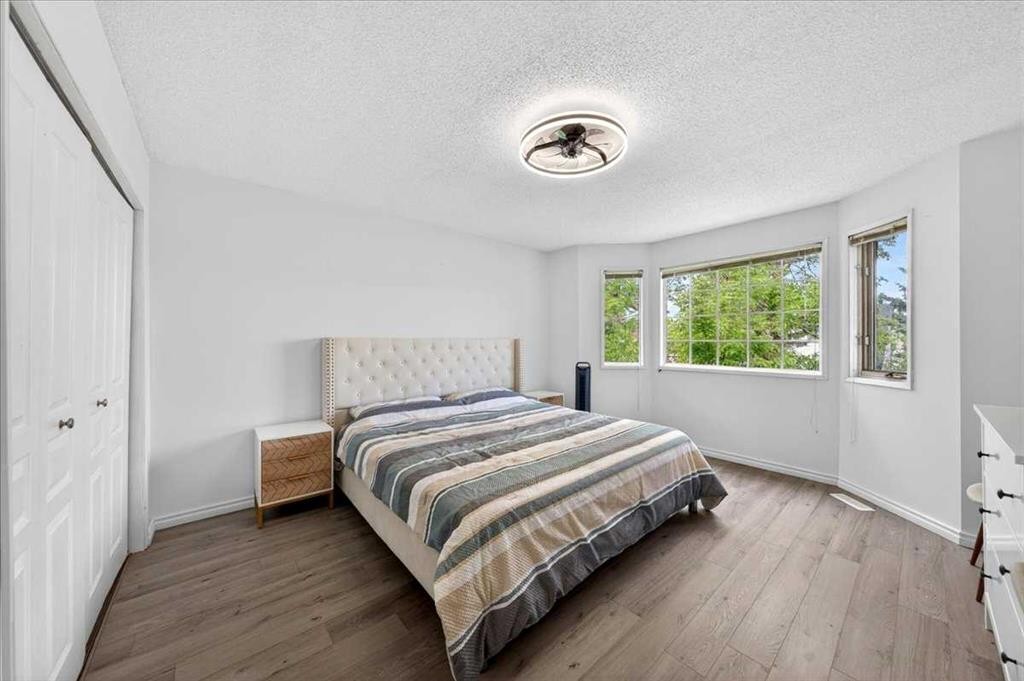 6979 Laguna Way Ne, Calgary, AB - Indoor Photo Showing Bedroom