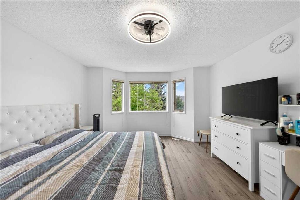 6979 Laguna Way Ne, Calgary, AB - Indoor Photo Showing Bedroom