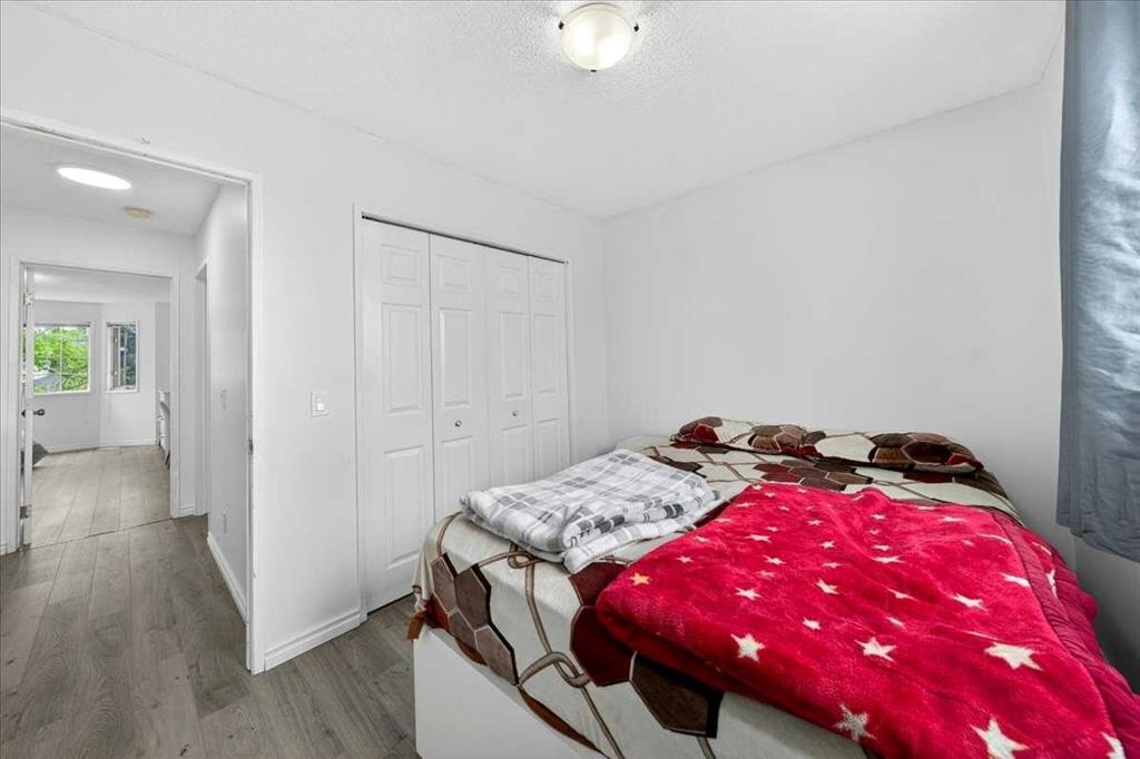 6979 Laguna Way Ne, Calgary, AB - Indoor Photo Showing Bedroom