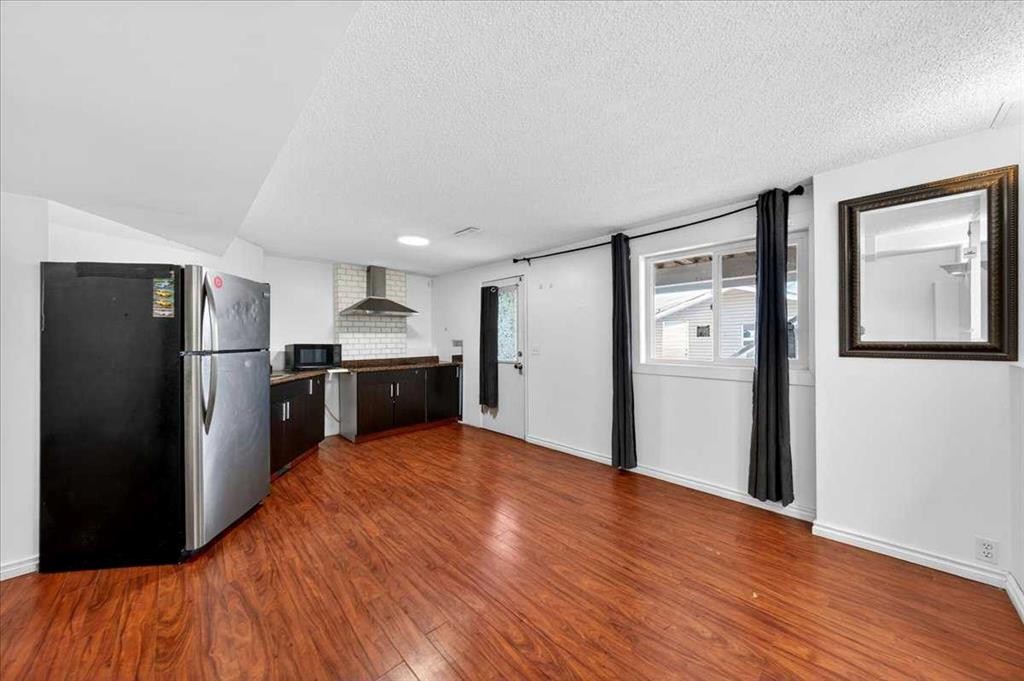 6979 Laguna Way Ne, Calgary, AB - Indoor Photo Showing Other Room