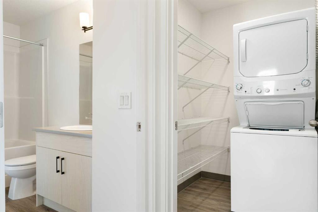 401-24 Rivercrest Drive, Cochrane, AB - Indoor Photo Showing Laundry Room