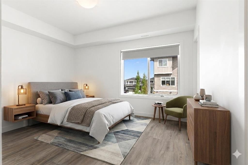 401-24 Rivercrest Drive, Cochrane, AB - Indoor Photo Showing Bedroom