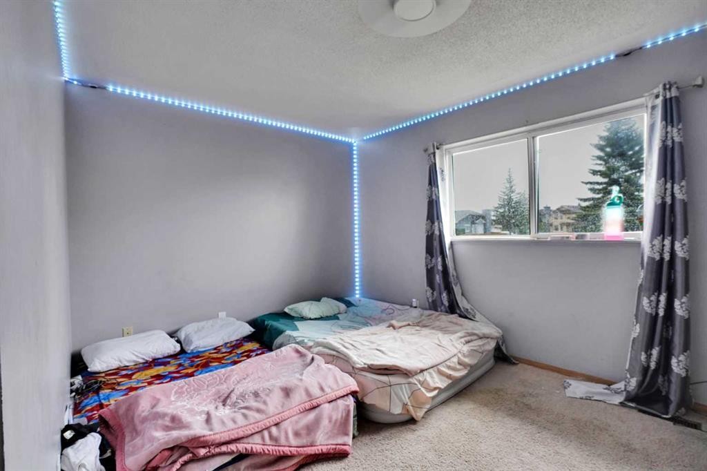 133 Martinglen Way Ne, Calgary, AB - Indoor Photo Showing Bedroom