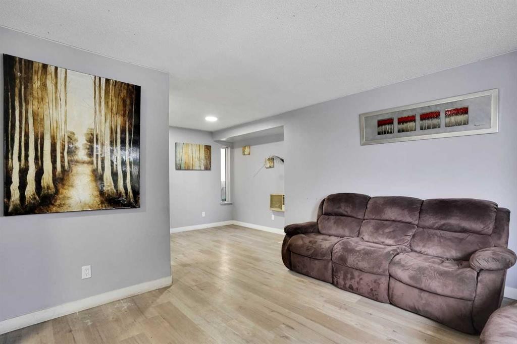 133 Martinglen Way Ne, Calgary, AB - Indoor Photo Showing Living Room