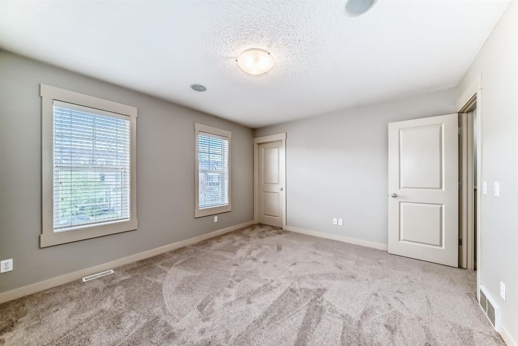 237 Rainbow Falls Drive, Chestermere, AB - Indoor Photo Showing Other Room