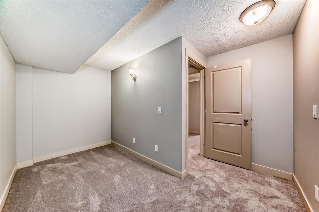 237 Rainbow Falls Drive, Chestermere, AB - Indoor Photo Showing Other Room