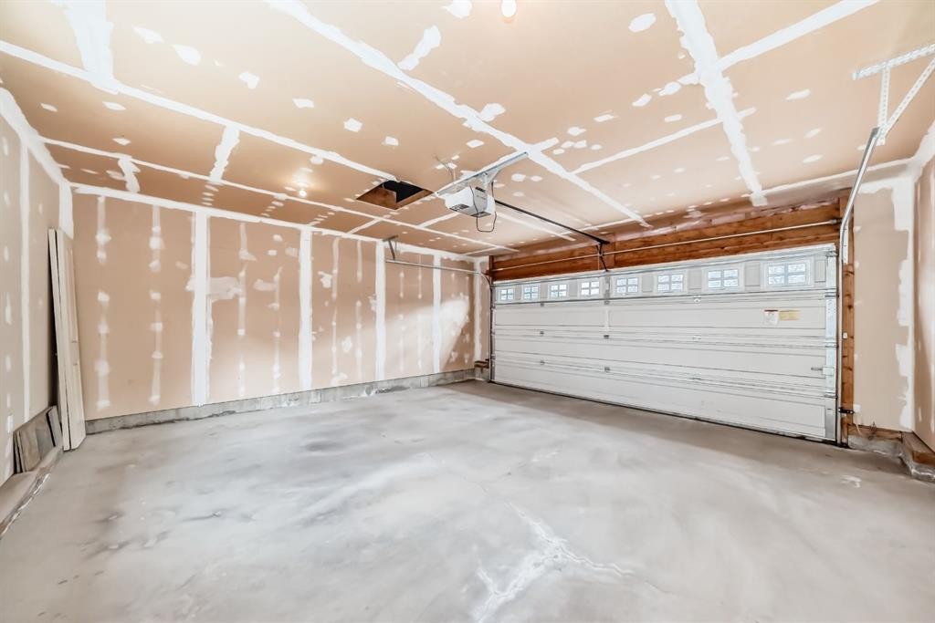 237 Rainbow Falls Drive, Chestermere, AB - Indoor Photo Showing Garage