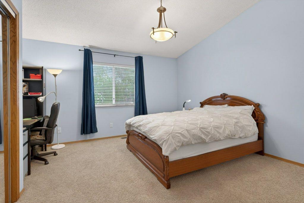156 Rivercroft Close Se, Calgary, AB - Indoor Photo Showing Bedroom