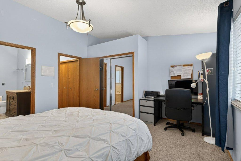 156 Rivercroft Close Se, Calgary, AB - Indoor Photo Showing Bedroom