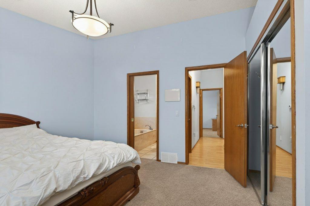 156 Rivercroft Close Se, Calgary, AB - Indoor Photo Showing Bedroom