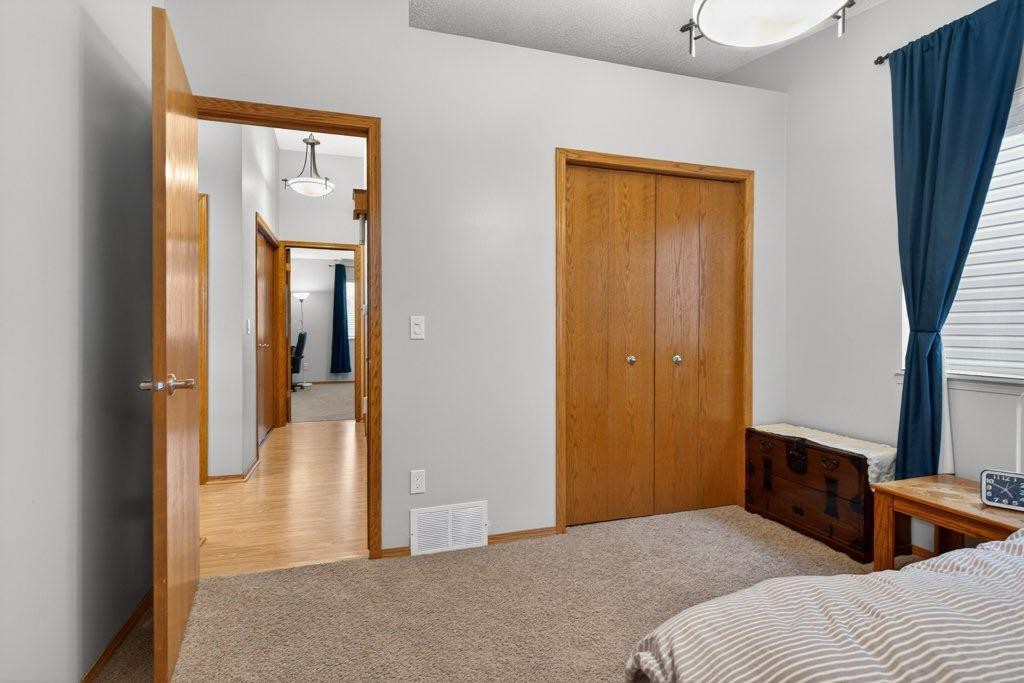 156 Rivercroft Close Se, Calgary, AB - Indoor Photo Showing Bedroom