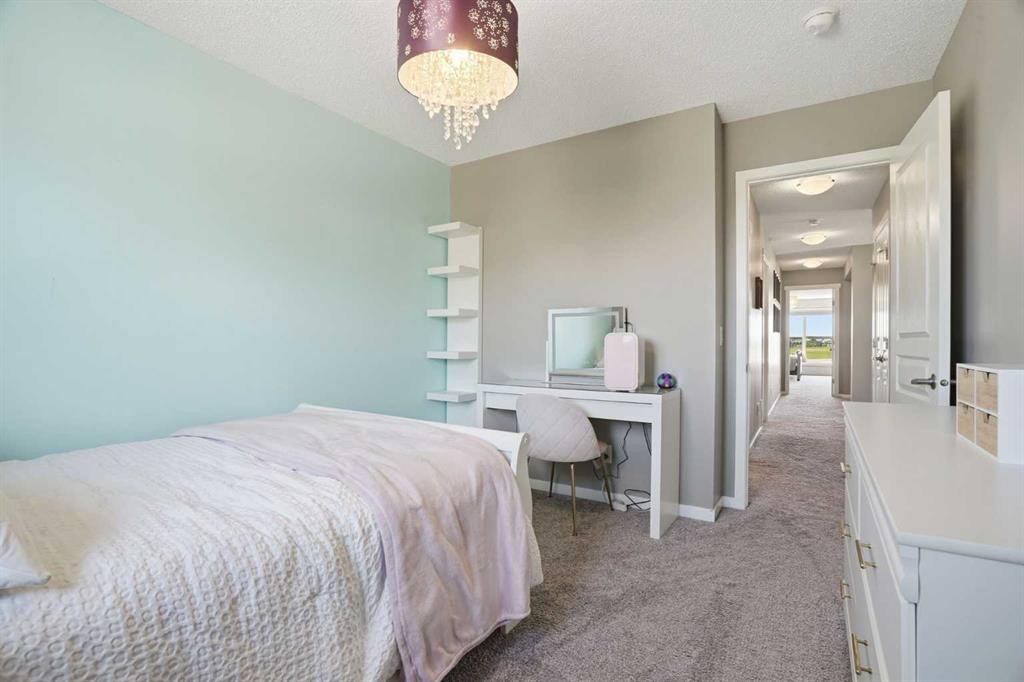 393 Masters Avenue Se, Calgary, AB - Indoor Photo Showing Bedroom