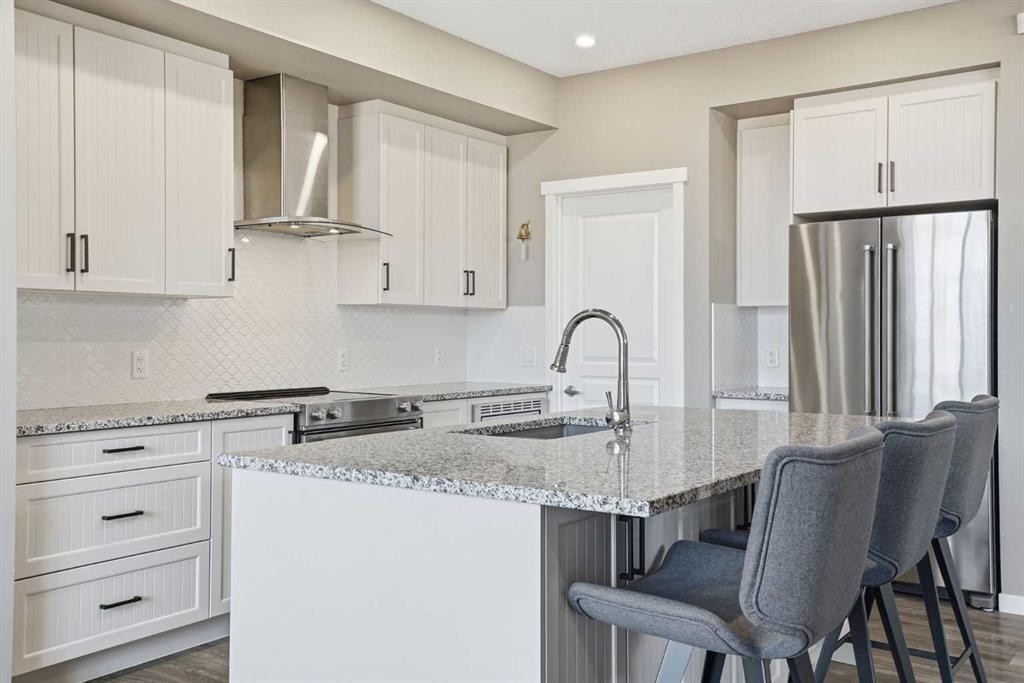 393 Masters Avenue Se, Calgary, AB - Indoor Photo Showing Kitchen With Upgraded Kitchen