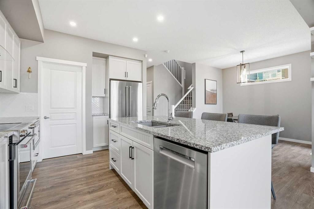 393 Masters Avenue Se, Calgary, AB - Indoor Photo Showing Kitchen With Upgraded Kitchen