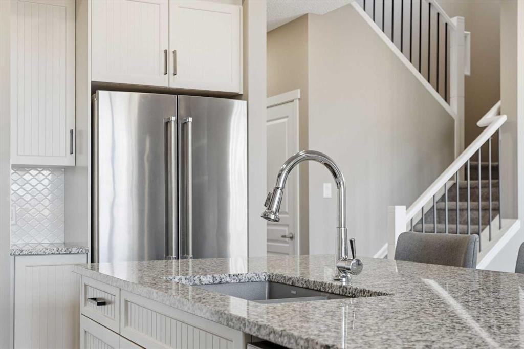 393 Masters Avenue Se, Calgary, AB - Indoor Photo Showing Kitchen With Upgraded Kitchen