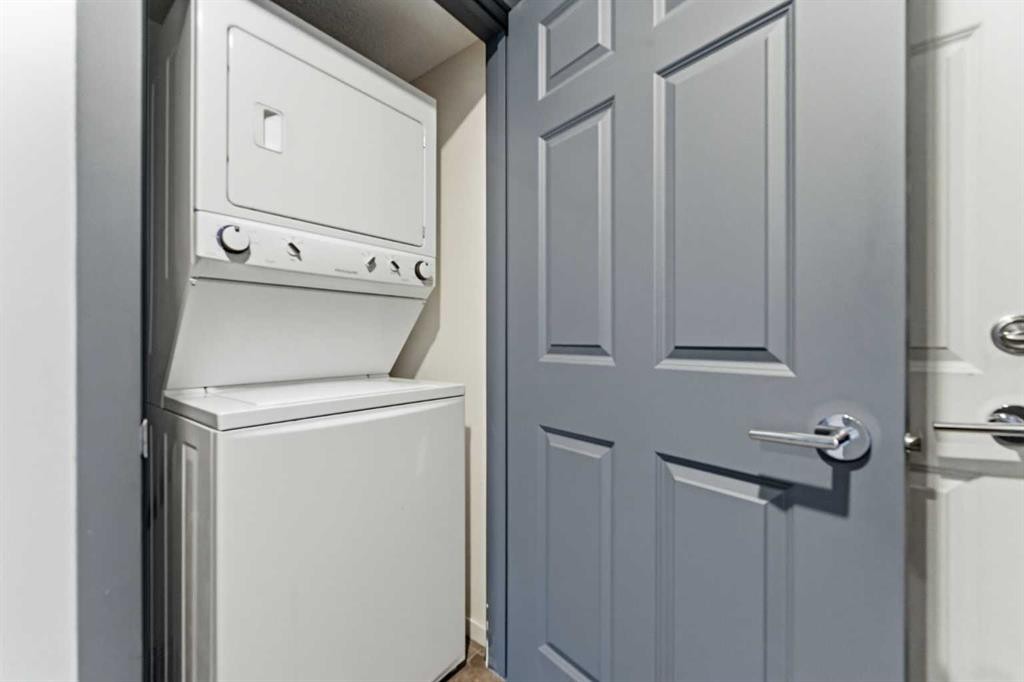 1204-755 Copperpond Boulevard Se, Calgary, AB - Indoor Photo Showing Laundry Room