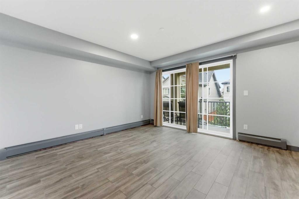 1204-755 Copperpond Boulevard Se, Calgary, AB - Indoor Photo Showing Other Room