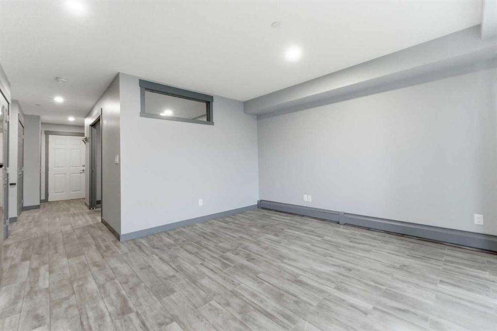 1204-755 Copperpond Boulevard Se, Calgary, AB - Indoor Photo Showing Other Room