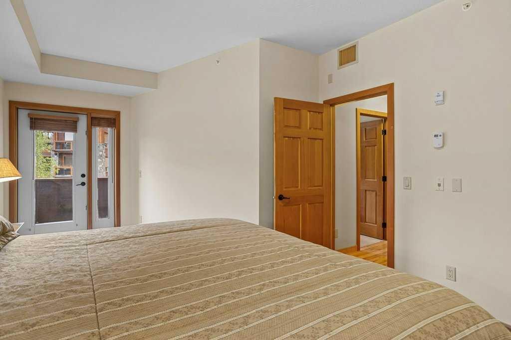 202-505 Spring Creek Drive, Canmore, AB - Indoor Photo Showing Bedroom