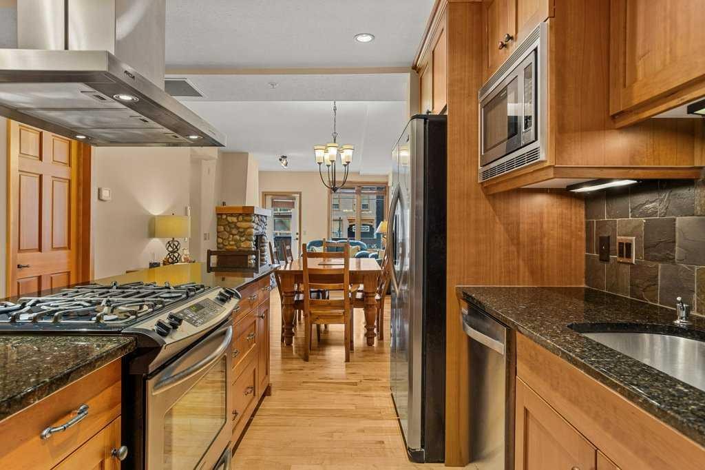 202-505 Spring Creek Drive, Canmore, AB - Indoor Photo Showing Kitchen