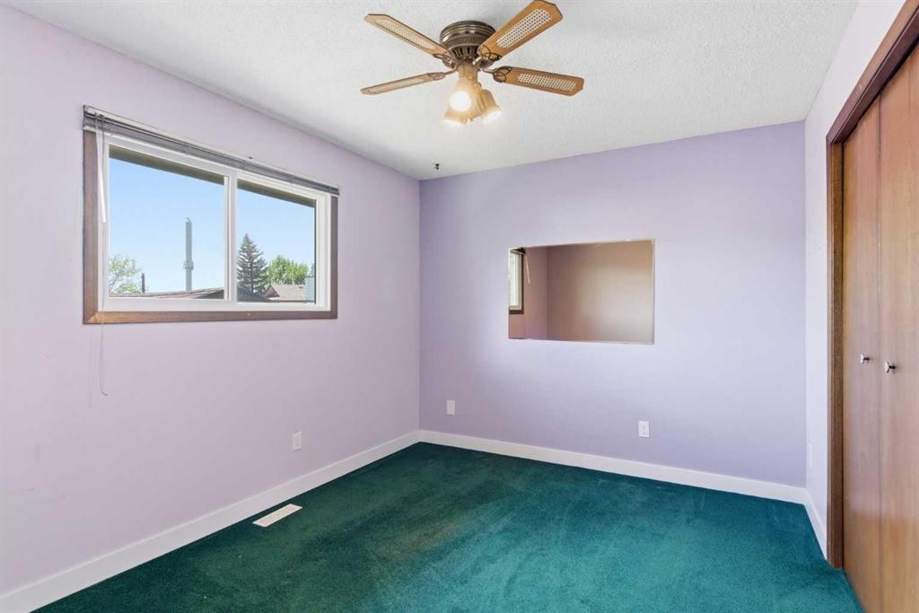 19 Templevale Way Ne, Calgary, AB - Indoor Photo Showing Other Room