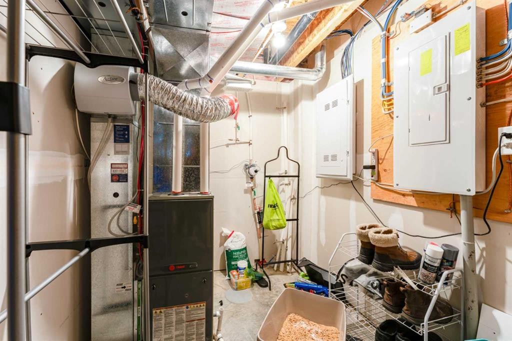 1402 Jumping Pound Common, Cochrane, AB - Indoor Photo Showing Basement