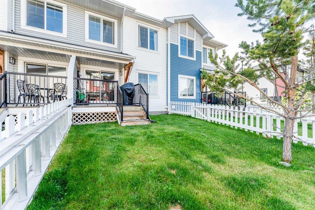 1402 Jumping Pound Common, Cochrane, AB - Outdoor With Deck Patio Veranda