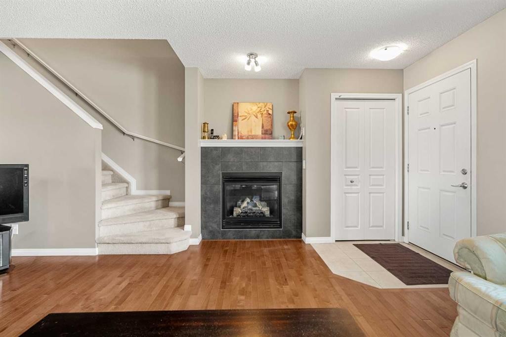 249 Elgin Meadows Park Se, Calgary, AB - Indoor With Fireplace