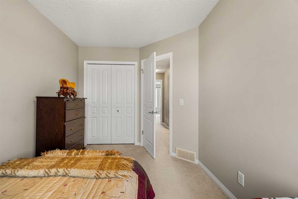 249 Elgin Meadows Park Se, Calgary, AB - Indoor Photo Showing Bedroom