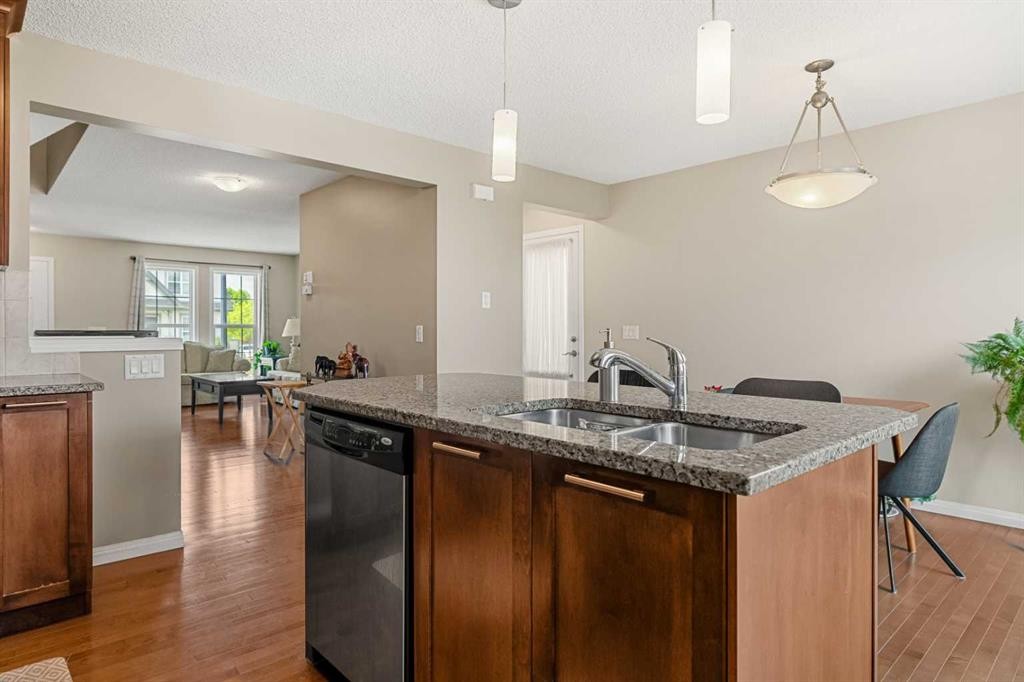 249 Elgin Meadows Park Se, Calgary, AB - Indoor Photo Showing Kitchen With Double Sink
