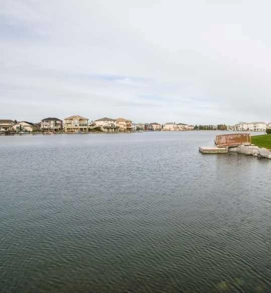 263 Coral Keys Drive Ne, Calgary, AB - Outdoor With Body Of Water With View