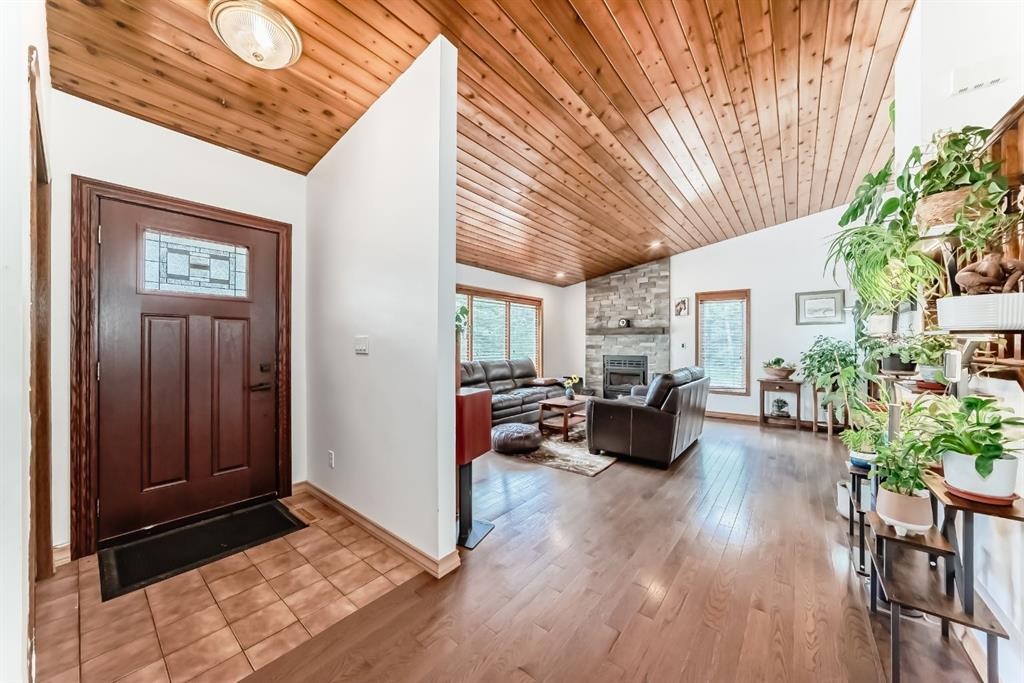 2 Wolf Close, Rural Rocky View County, AB - Indoor With Fireplace