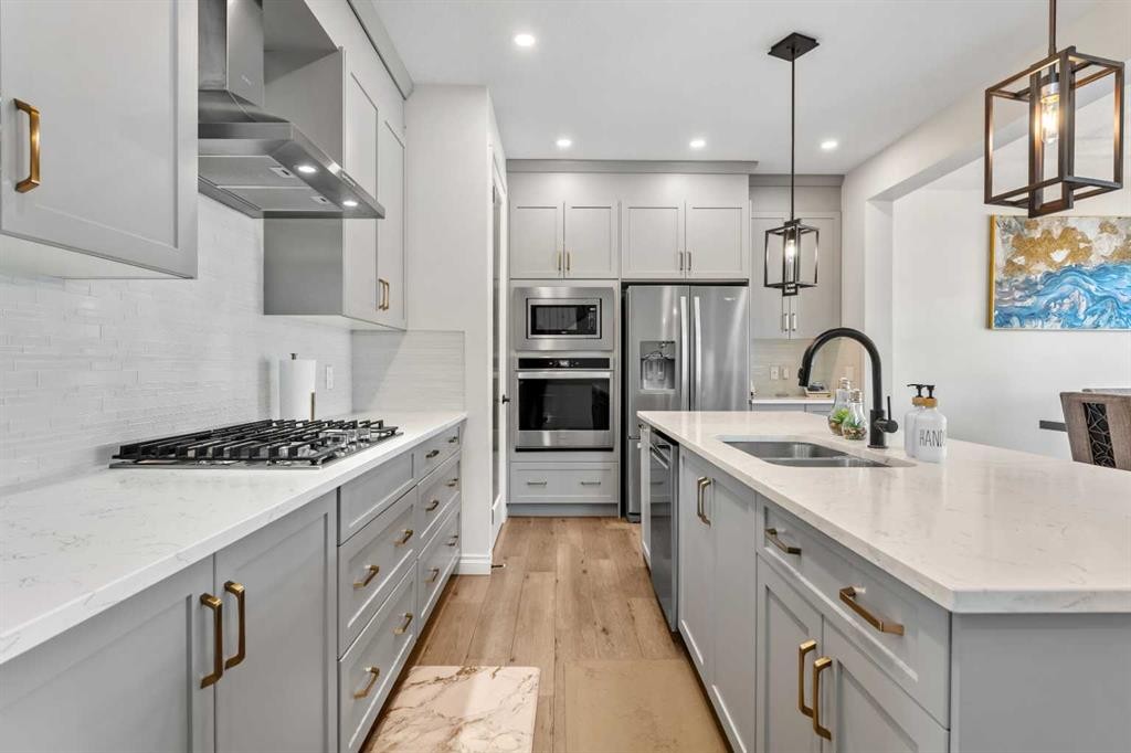 58 Sage Hill Heights Nw, Calgary, AB - Indoor Photo Showing Kitchen With Double Sink With Upgraded Kitchen