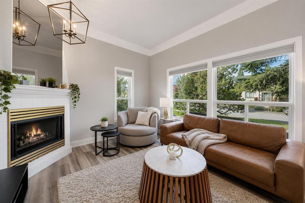 107 Mission Road Sw, Calgary, AB - Indoor Photo Showing Living Room With Fireplace