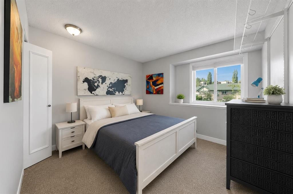 107 Mission Road Sw, Calgary, AB - Indoor Photo Showing Bedroom