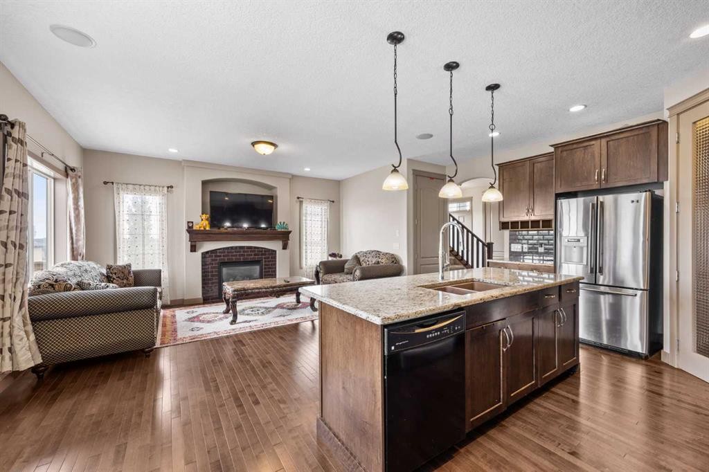 282 Pantego Terrace Nw, Calgary, AB - Indoor Photo Showing Kitchen With Fireplace With Double Sink With Upgraded Kitchen