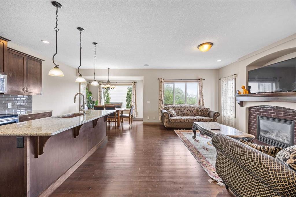 282 Pantego Terrace Nw, Calgary, AB - Indoor Photo Showing Other Room With Fireplace