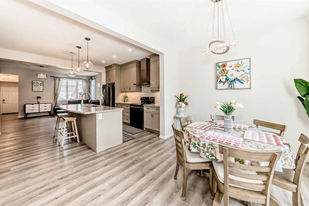131 Carringham Road Nw, Calgary, AB - Indoor Photo Showing Dining Room