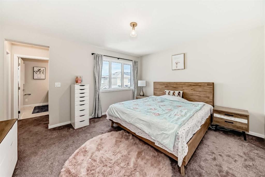 131 Carringham Road Nw, Calgary, AB - Indoor Photo Showing Bedroom