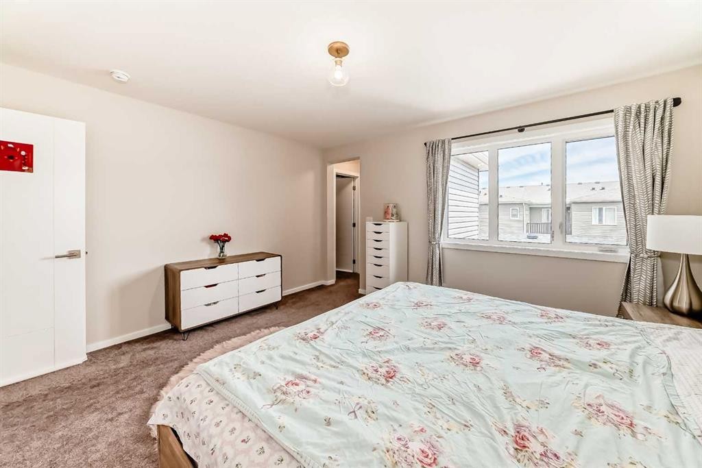 131 Carringham Road Nw, Calgary, AB - Indoor Photo Showing Bedroom
