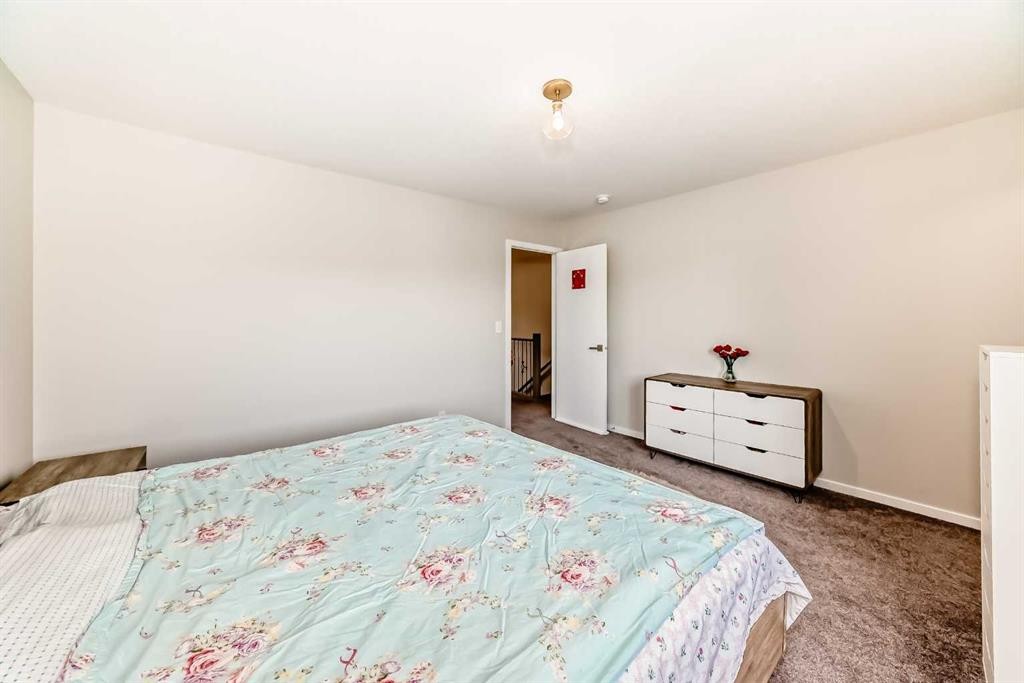 131 Carringham Road Nw, Calgary, AB - Indoor Photo Showing Bedroom