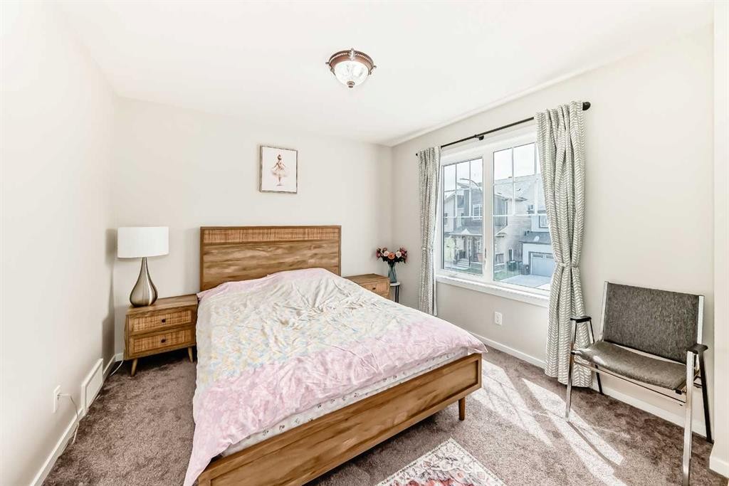 131 Carringham Road Nw, Calgary, AB - Indoor Photo Showing Bedroom