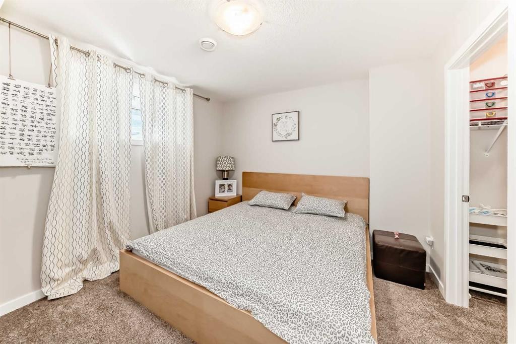131 Carringham Road Nw, Calgary, AB - Indoor Photo Showing Bedroom