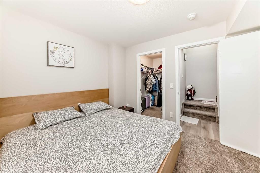 131 Carringham Road Nw, Calgary, AB - Indoor Photo Showing Bedroom
