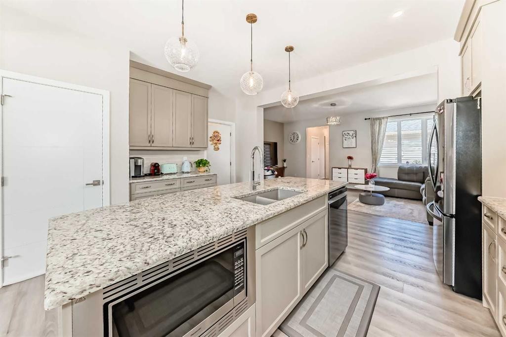 131 Carringham Road Nw, Calgary, AB - Indoor Photo Showing Kitchen With Double Sink With Upgraded Kitchen