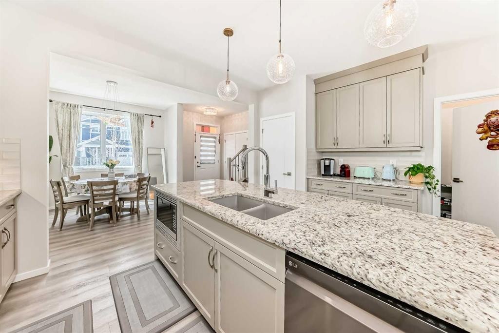 131 Carringham Road Nw, Calgary, AB - Indoor Photo Showing Kitchen With Double Sink With Upgraded Kitchen