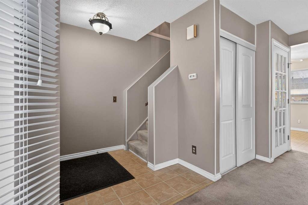 147 Martindale Drive Ne, Calgary, AB - Indoor Photo Showing Other Room