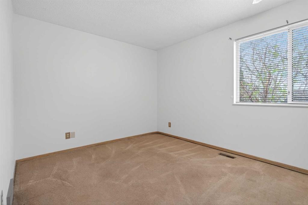 147 Martindale Drive Ne, Calgary, AB - Indoor Photo Showing Other Room